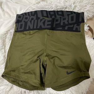 green nike pros